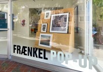 Colorful image of a building with large windows and a sign that reads Fraenkel Pop-up