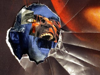 Color photo of a collage of comic strips and creased paper, showing a screaming man