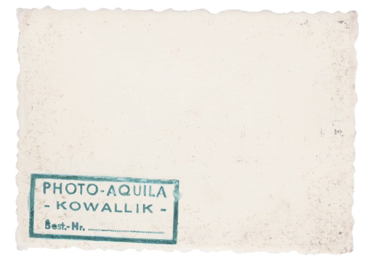 Verso of painting with a stamp in the bottom left corner