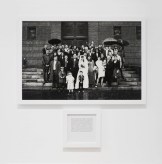 Installation photograph of framed prints on gallery walls