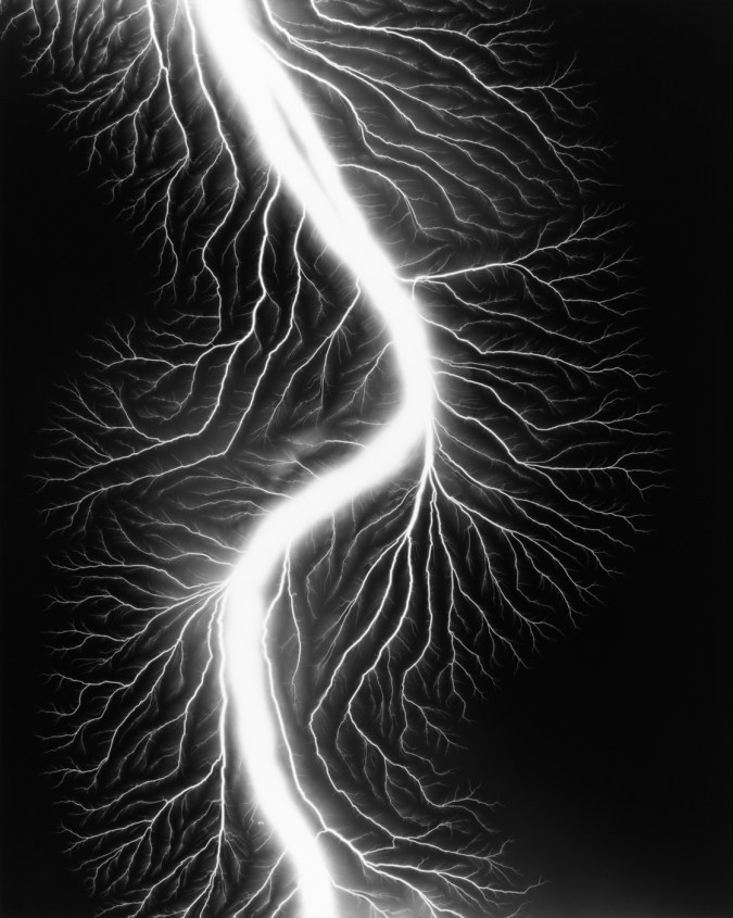 Black and white photograph of lighting striking